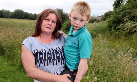Rebecca Currie with her son, Mathew Richards, five, who live near the landfill site in Silverdale, Staffordshire