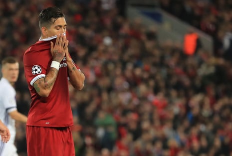Liverpool’s Roberto Firmino looks dejected.