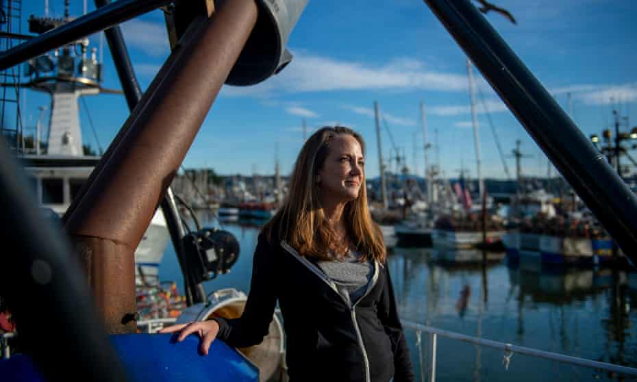 Taunette Dixon, former president of the Newport Fishermen’s Wives, an organization that supports the fishing community, poses for a portrait on the Tawny Ann, a family fishing vessel In Newport, Ore. on January 7, 2021. From a fourth-generation fishing family, Dixon’s shore-side role is emblematic of the often overlooked contribution of women to the fishing industry. Amanda Lucier for The Guardian
