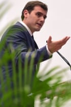 Ciudadanos leader Albert Rivera gestures from a podium