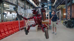 a robotics researcher at work, in Lo and Behold