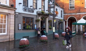 Christmas pudding covers have been put over large round bollards in the town centre of High Wycombe.
