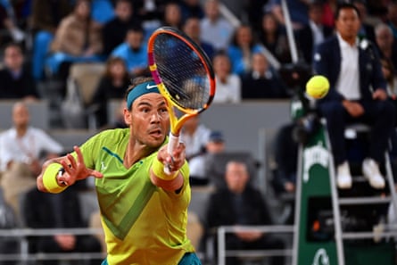Rafael Nadal plays a backhand on his way to straight-sets victory over Corentin Moutet