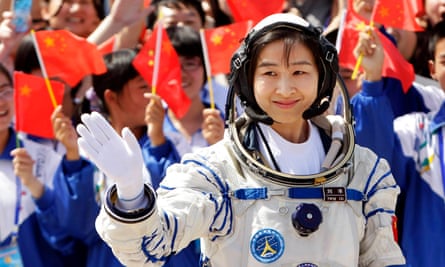Liu Yang, China’s first female astronaut, waves during a departure ceremony before becoming the first Chinese woman in space in June 2012.
