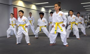 An intermediate group in one of Busuttil’s taekwondo classes.