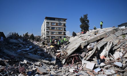 Search and rescue works at collapsed buildings in Hatay on 9 February.