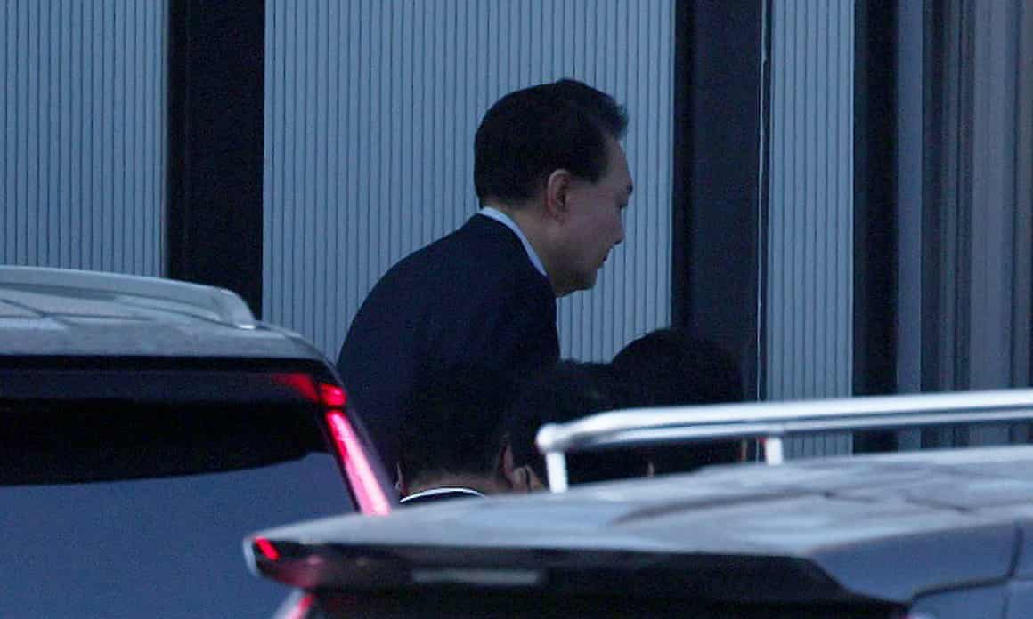 Impeached South Korean President Yoon Suk Yeol arrives at the corruption investigation office for high-ranking Officials in Gwacheon