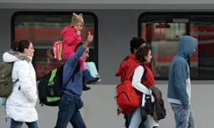 Refugees arrive at Munich main station