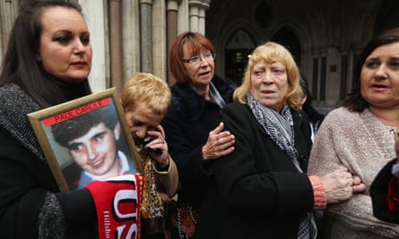 Families outside the high court in London on 19 December 2012 after the first verdict was quashed.