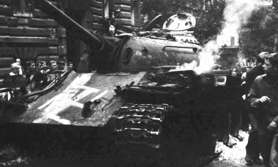 A Warsaw Pact tank daubed with a swastika.