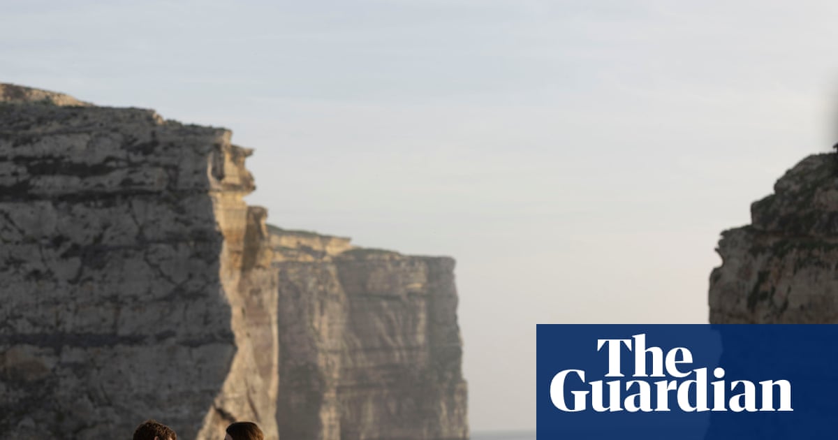 ‘That’s when the shark fins appeared’: your horrifying holidays – from natural disasters to missile threats