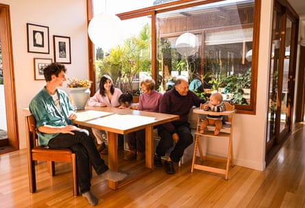The duplex is built upwards to retain the back yard – with the grandparents in the original home downstairs and Booth and Farrow-Palmer upstairs with their two children.