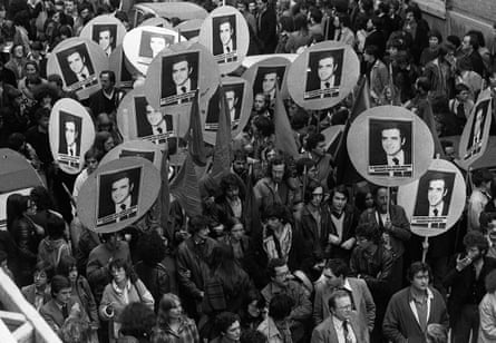 ‘Goldman became a saint to the left’ … mourners carry placards at the funeral, which was attended by Jean-Paul Sartre.