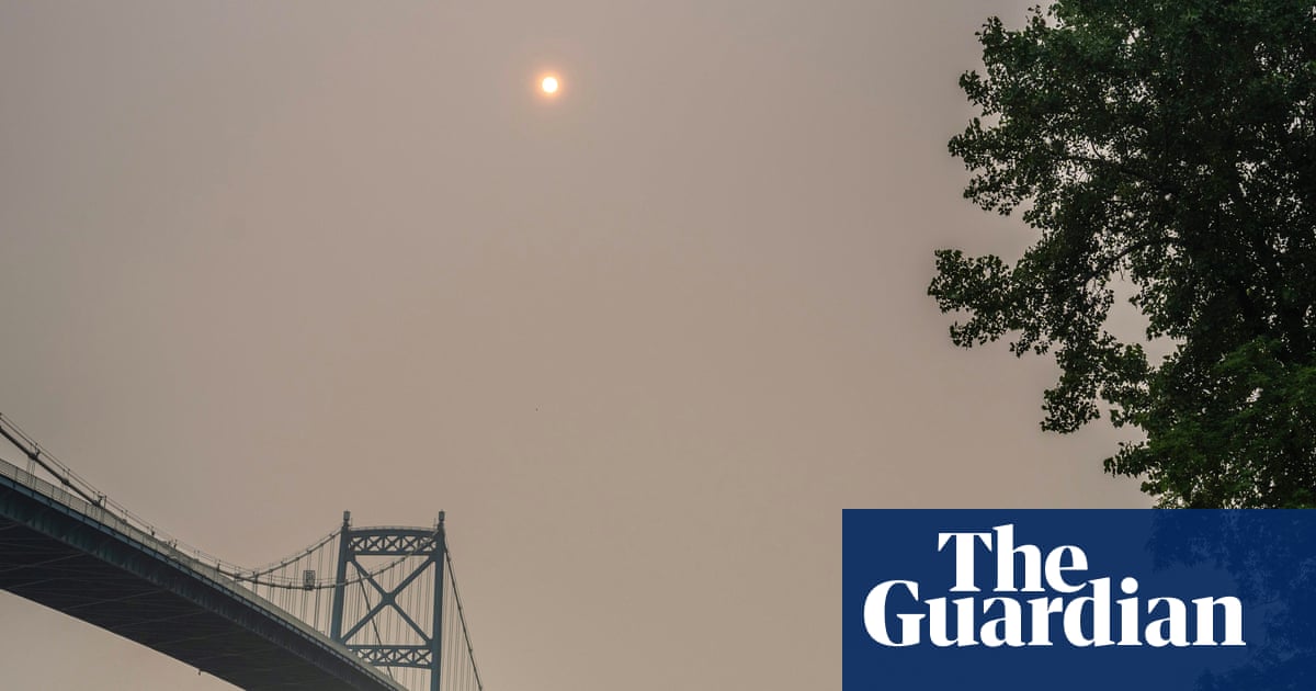 Toronto’s sunrise, now available in ‘apocalyptic sepia’—brought to you by global emissions and a US president threatening tariffs on atmospheric circulation.
