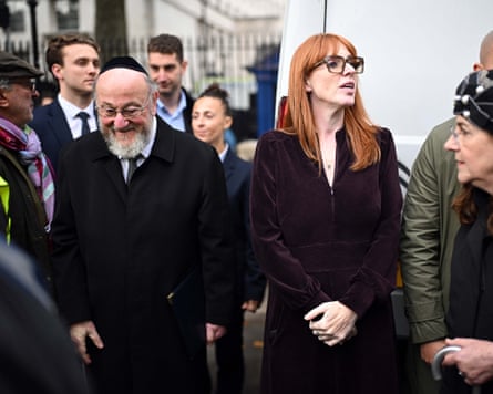 A group of people, including Ephraim Mirvis and Angela Rayner at a memorial event.