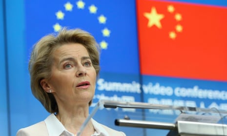 The European Commission president, Ursula von der Leyen, against a backdrop of the EU and Chinese flags