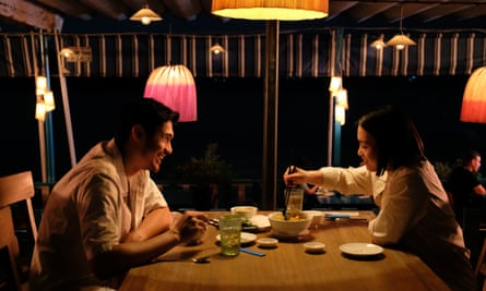 Molly Harris, right, with Henry Golding in Monsoon.