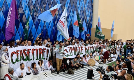 Climate activists protest in support of Palestinians in Gaza at Cop28 in Dubai.