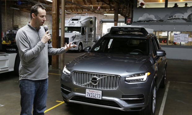 Anthony Levandowski discusses Uber’s self-driving cars in San Francisco. An Otto truck can be seen in the background.