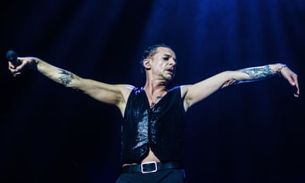 Gahan on stage in 2018, in black leather waistcoat
