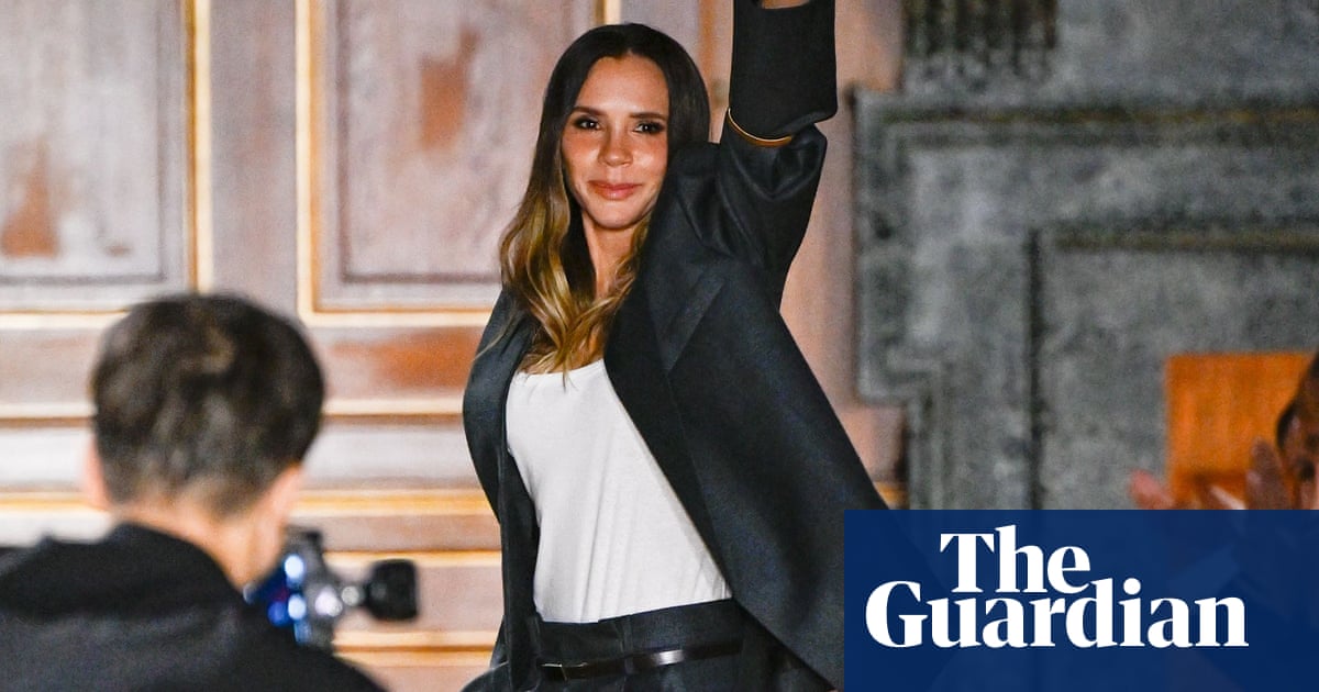 Resurgent Victoria Beckham channels trouser suits and party dresses at Paris show