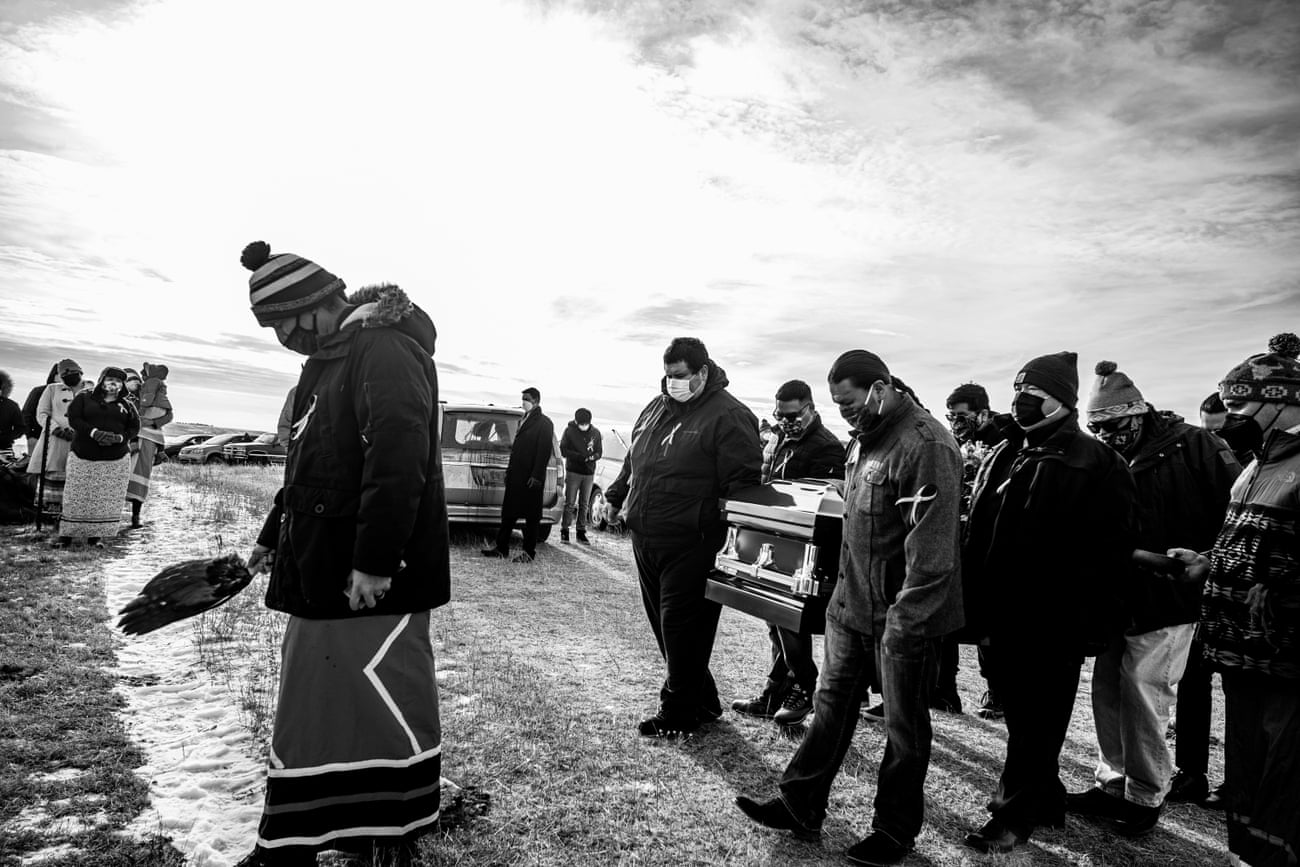 The death of husband and wife Jesse “Jay” and Cheryl Taken Alive delivered a major blow to the clan and the Standing Rock Tribe. They were buried on a family plot south of Cannon Ball, North Dakota. overlooking the Missouri River. Photographs made with the consent of the family. Coverage of COVID-19 on the Standing Rock Indian Reservation. 