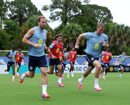 Harry Kane and Dan Burn return portion successful a moving drill during a training convention connected Thursday