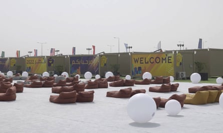 In this photo taken from video, a view of large bean-bag style chairs are seen in front of accommodation cabins in the fan village in Doha, Qatar, Wednesday, Nov. 9, 2022.
