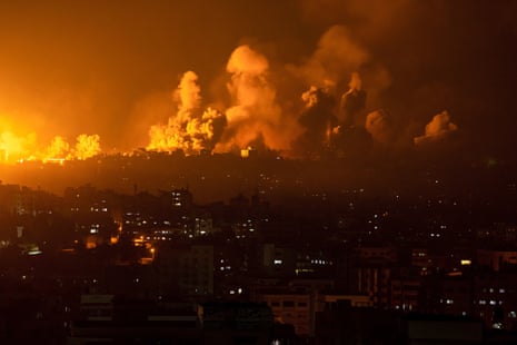 Fire and smoke rise after an Israeli airstrike in Gaza City.