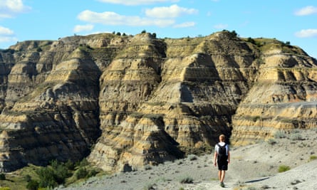 Mikah Meyer hiking the Caprock Coulee Trail in North Dakota’s Theodore Roosevelt National Park.