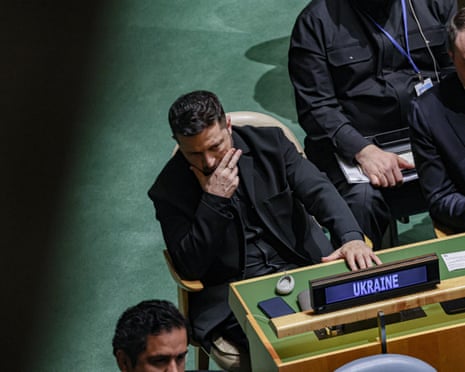 Ukrainian President Volodymyr Zelenskyy sits in the General Assembly Hall as he listens to US president Donald Trump address the 81st UN general assembly.