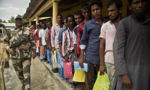 Men queuing to check if their names are included in the National Register of Citizens in 2018. 5760.jpg?width=300&quality=85&auto=forma