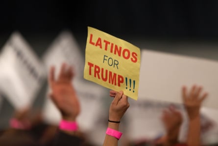 people holding a sign