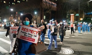New York nurses hold a vigil in support of health workers across the US.