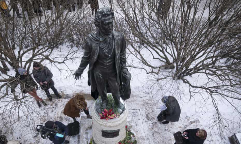 People marked the 180th anniversary of Pushkin’s death at a monument in St Petersburg.