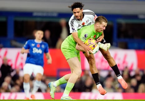 Everton goalkeeper Jordan Pickford collides with Fulham’s Raúl Jiménez at Goodison Park