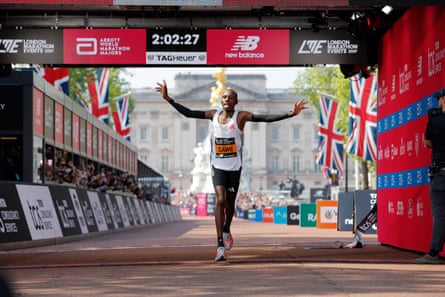 Kenya’s Sabastian Sawe crosses the line to win the men’s race at the 2025 London Marathon