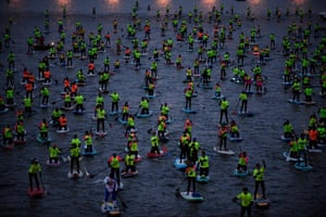 Paris, France: People take part during the 12th paddle race organised by the Nautic Festival on the Seine