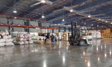 Humanitarian assistance to be sent to Turkey is prepared at Al Udeid air base in Qatar.