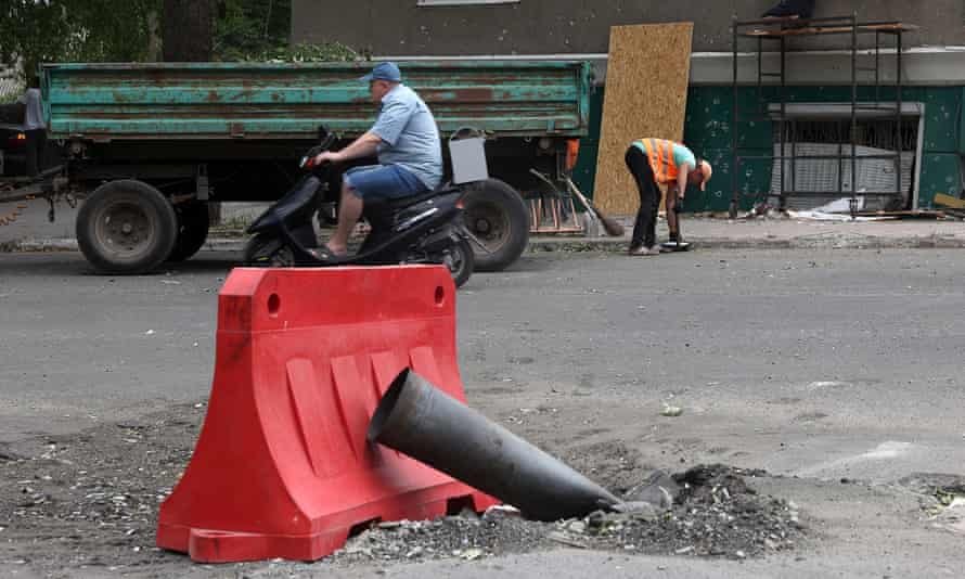 A picture shows the remains of a rocket in the street, after a night airstrike, in the town of Bakhmut, Donetsk Oblast.