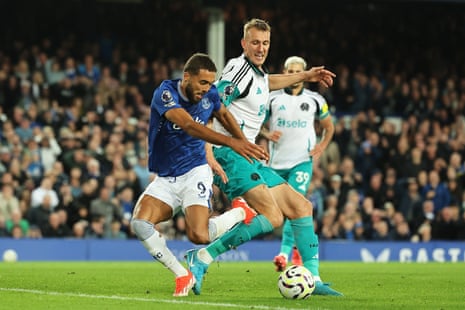 Dominic Calvert-Lewin of Everton is challenged by Dan Burn of Newcastle during the goalless draw at Goodison Park, before the referee rules that it’s not a penalty