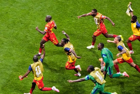Congo's Yoane Wissa (20) celebrates with teammates after scoring their third goal