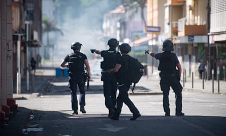 French police in New Caledonia during deadly unrest in June