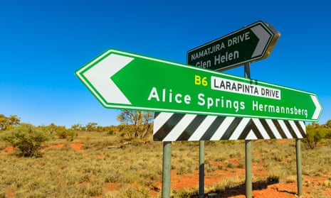 Northern Territory road signs pointing to Hermannsburg and Alice Springs