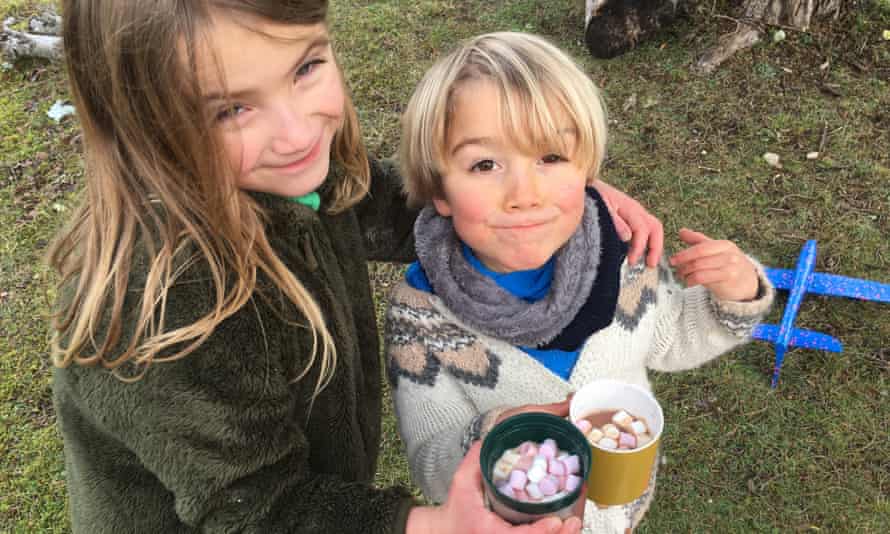 The author’s children enjoy hot chocolate with marshmallows
