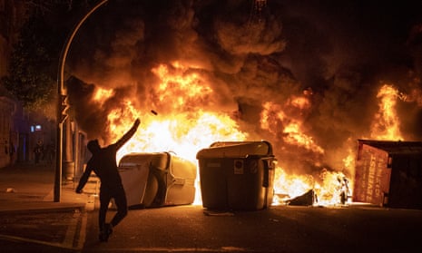 A burning barricade amid the third night of street protests in Barcelona and other Spanish cities over the jailing of Pablo Hasél.