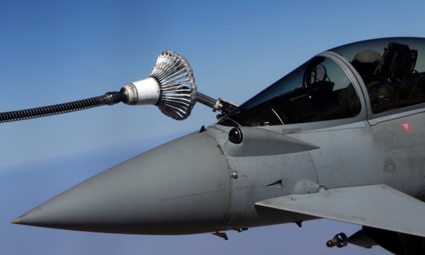 An RAF Typhoon aircraft refuel from a tanker aircraft during a mission over central Iraq
