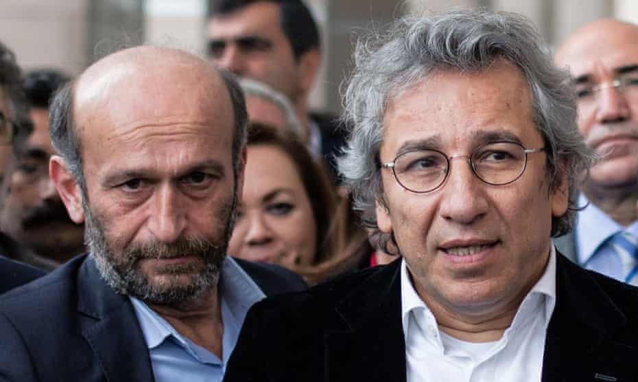 Can Dundar, editor-in-chief of opposition newspaper Cumhuriyet, right, and Ankara bureau chief Erdem Gul outside court on Thursday.