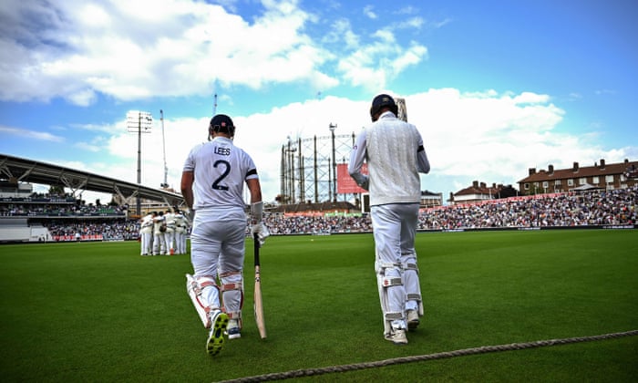 England's Alex Lees (left) and Zak Crawley walk out to bat.
