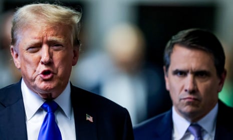 Todd Blanche stands behind former US president Donald Trump as he speaks to the media after his conviction.